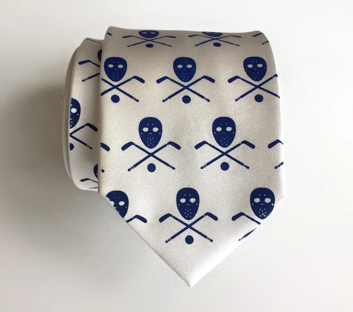 Hockey necktie. Stick, mask & puck print.