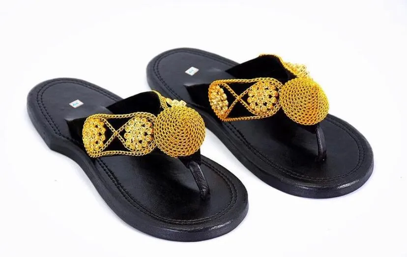 The Akan gold ornament Comfiest Slippers in modern design